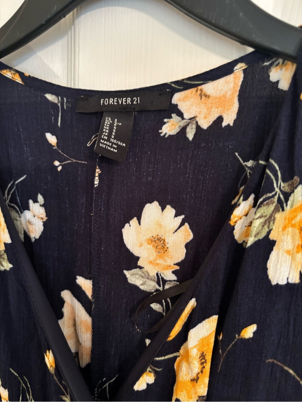 Forever 21 Navy Floral Wrap-Style high low romper with Yellow Blooms - Picture 2 of 3